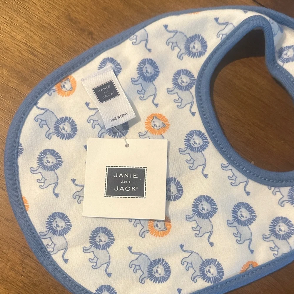 Janie and Jack White Bib with Blue Trim and Embroidered Lion Accent